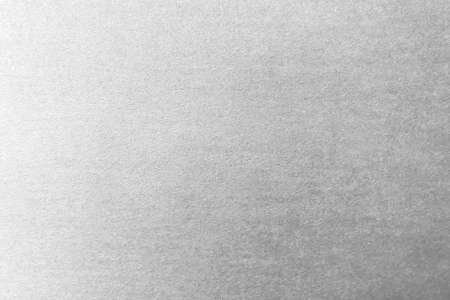 Textured paper background. The color of the paper is gray. Place for textの写真素材