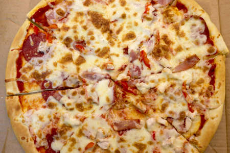 Pizza with chicken ham and tomatoes. view from above. Pizza Margaritaの写真素材
