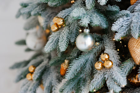 Christmas decoration on an abstract background. Festively decorated Christmas tree. Happy New Year....
