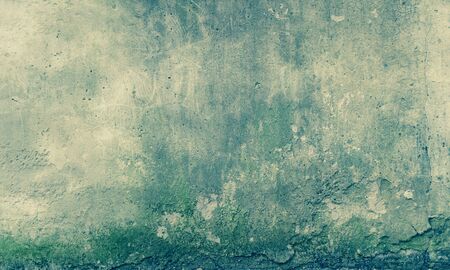 Grunge Background  The Old Wall which has been Covered with Concrete with Cracks and Dirt Spots 