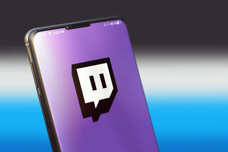 KYIV, UKRAINE-JUNE, 2020: Twitch Mobile Application on the Smartphone Screen. Close-up Studio Shot...