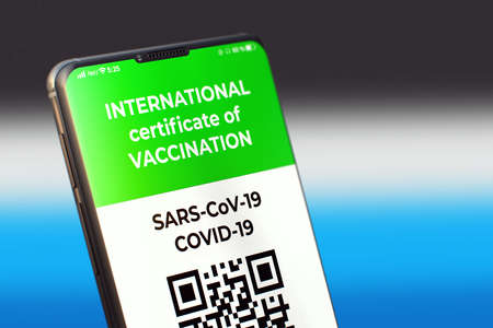 COVID-19: Digital green certificate. Vaccinated digital health passport. Mobile Application on the Cellphone Screen. Vaccinated digital health passport valid digital vaccination certificate. 3D Renderの写真素材