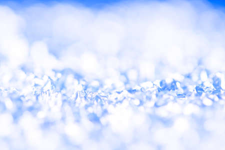 Abstract blue and white bokeh background