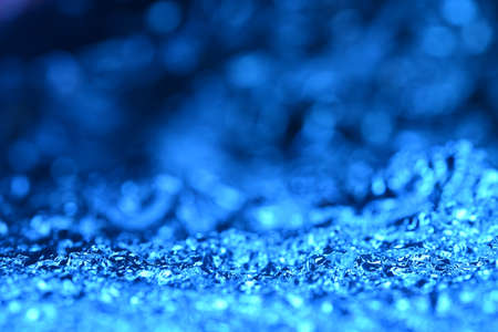 Blue glitter lights texture. Abstract christmas background.の写真素材