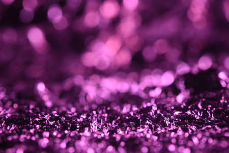 Purple glitter lights texture. Abstract christmas background.の写真素材