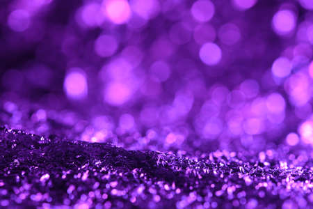 Purple glitter lights texture. abstract christmas backgroundの写真素材