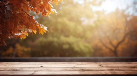 Wooden table in front of blurred autumn background. Collage.の素材