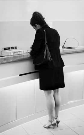 Filing deposit in bank's branchの写真素材