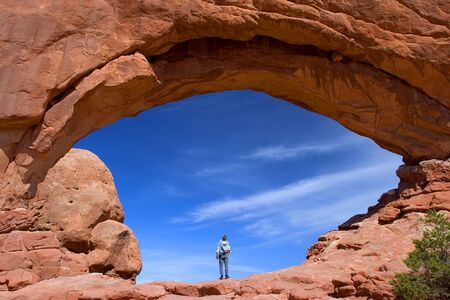Lone hiker in Arches National parkの写真素材