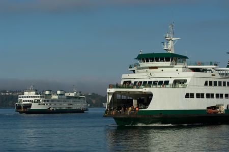 Two ferries in Seattle harborの写真素材