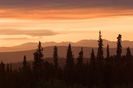 Alaska. June sunset in the land of Midnight sunの写真素材