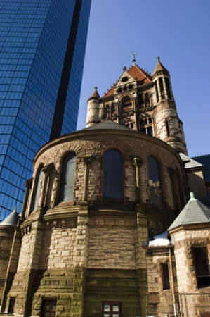 Trinity church and Hancock tower as two famous Boston landmarks in Back Bayの写真素材