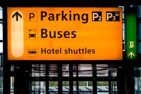 Parking and transportation signs in Schiphol airport, Amsterdamの写真素材