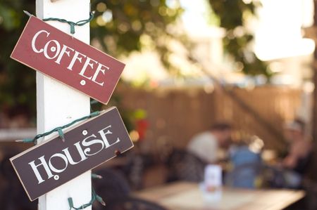 People sitting in outdoor coffee houseの写真素材