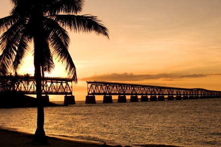 Ruins of old railroad bridge in sunset, Florida Keysの写真素材