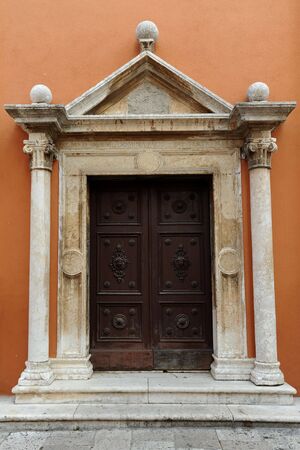 Beautiful door of historical Zadar church, Croatiaの写真素材