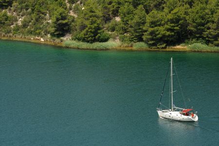 Yacht cruising on Krka river, Dalmatian coast, Croatia