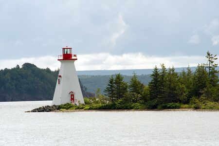 Bras D'Or lake lighthouse near Baddeck, Cape Breton, Nova Scotiaの写真素材
