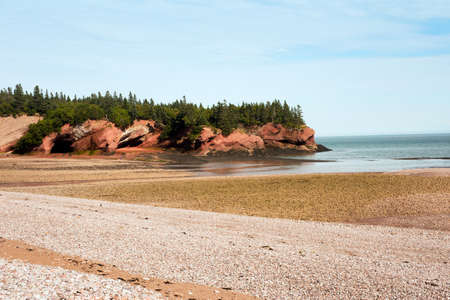 Famous sandstone sea caves in St Martins, New Brunswickの写真素材