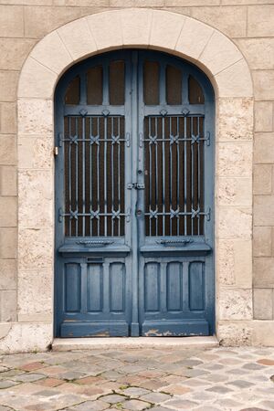 Iron door in blue color in the old part of Chartres, Franceの写真素材