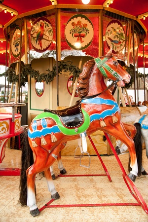 Antique carousel at Christmas market on Dusseldorf town squareの写真素材