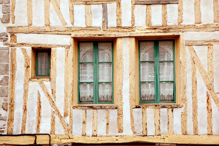 Windows of medieval timberframe house in historic Dinan, Brittanyの写真素材