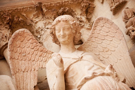 Famous smiling angel on facade of Reims Cathedralの写真素材