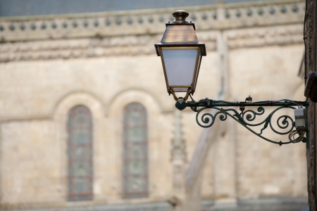 Street lamp with Le Mans cathedral on backgroundの写真素材
