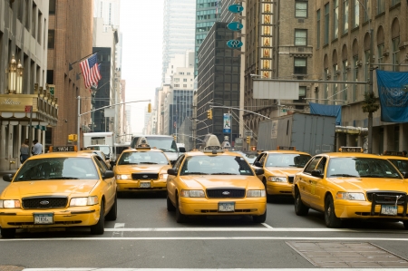 March 15th, 2007, NEW YORK CITY, USA -Row of taxi cabs on Park Avenue with Waldorf Astoria hotel on...