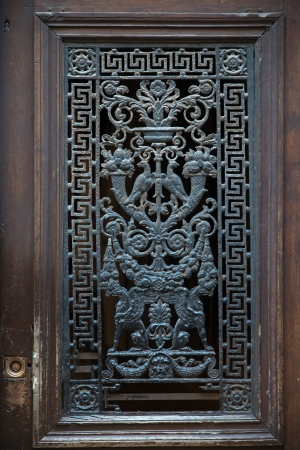 Exquisite metal door of one old Rouen buildingの写真素材