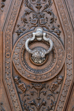 Ancient door with silver knocker in Granada, Spainのeditorial素材