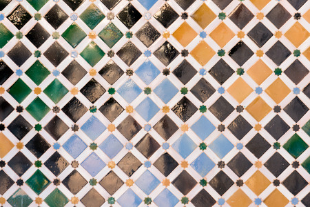 Mosaic tiles on the wall of Nazaries palace, Alhambra, Spainの写真素材