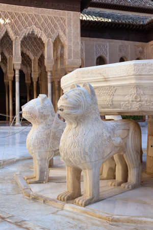 Close up of famous fountain in Court of the Lions in Alhambra palace, Granadaの写真素材