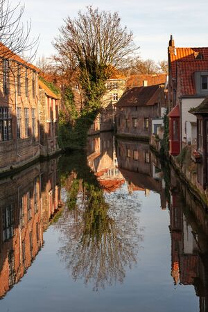 Typical houses around Dijver canal in historic center of Brugesの写真素材