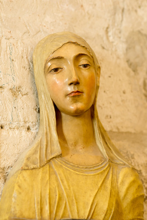 Beautiful wooden statue of St Catherine of Siena inside Papal Palace in Avignonのeditorial素材