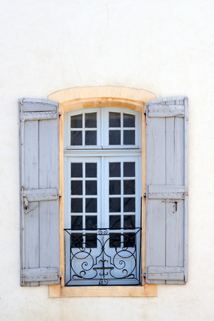 Picturesque window in historic center of Avignon, Provenceの写真素材