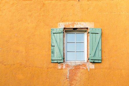 Colorful typical house in Roussillion village in Provence countryside, Franceの写真素材