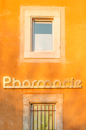 Pharmacy store in Roussillion village in Provence countryside, Franceの写真素材