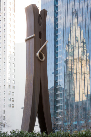 Famous Clothpin sculpture by Claes Oldenburg and reflection of Philadelphia City Hall on August 2, 2009. Sculpture located on Centre Square.のeditorial素材