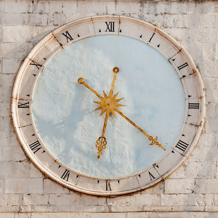 Clock tower and Loggia on Trg Ivana Pavla II in old Croatian town of Trogirの写真素材