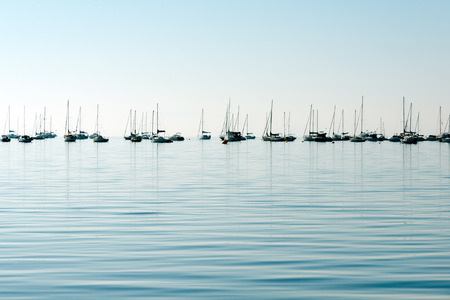 Fishing boats and yachts by the coast of of San Pedro del Pinatar coast, Spainの写真素材