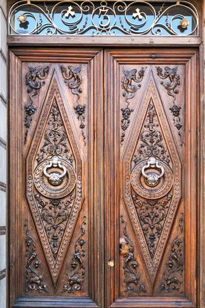 Exquisite ancient door with silver knockers in Granada, Spainの写真素材