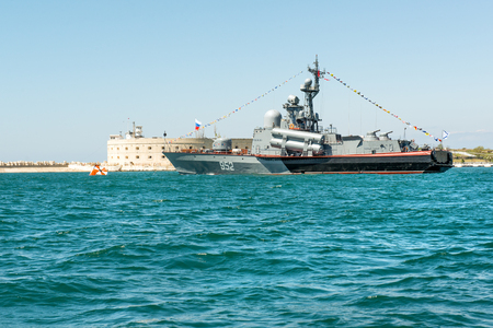 SEVASTOPOL, CRIMEA - MAY 9: Parade of the Russian warships celebrating Victory Day on May 9th, 2015. Russian Navy Tarantul class corvette "Breeze" in the Sevastopol Bay, Crimeaのeditorial素材