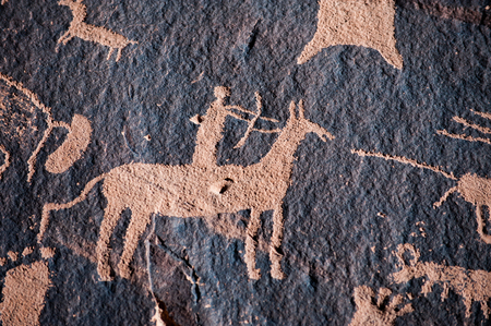 Hunter petroglyph on Newspaper Rock in Canyonlands National Park, Southwest USAの写真素材