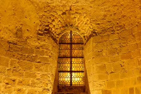 Window on the corridor wall inside Mont Saint-Michel abbey, Normandy coast, Franceの写真素材