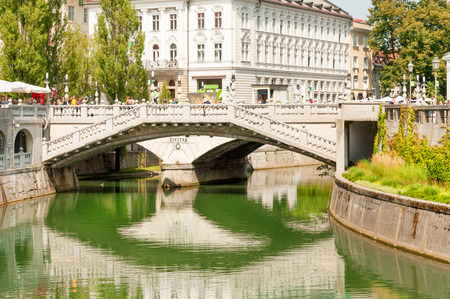 Close up of famous Triple bridge (Tromostovje) above Ljubljanica river in the center of Ljubljana, Sloveniaのeditorial素材