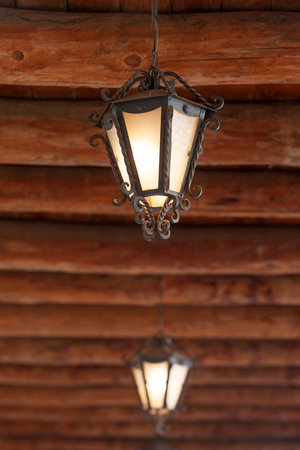 Lamp and wooden ceiling detail of the walkway in Old Town Plaza, Albuquerque, New Mexico, USAの写真素材