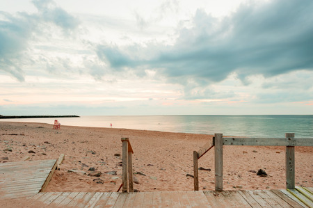 Boardwalk of the Inverness beach at sunset, Nova Scotia, Canadaの写真素材