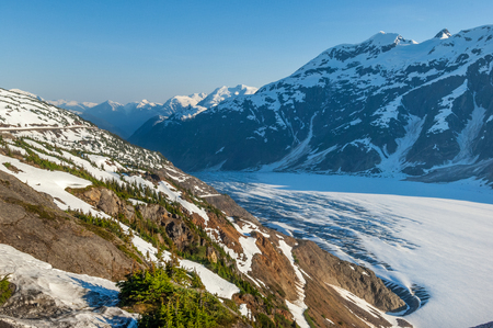Salmon Glacier flowing between Boundary Ranges on the border of British Columbia and Alaskaの写真素材