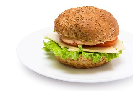 sandwich with cheese, lettuce and tomato on white backgroundの写真素材